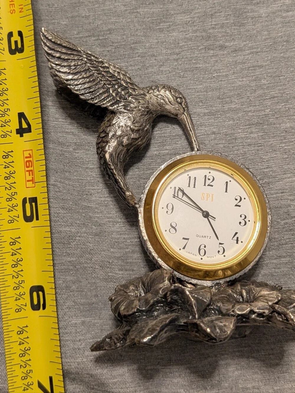 S P I elegant hummingbird